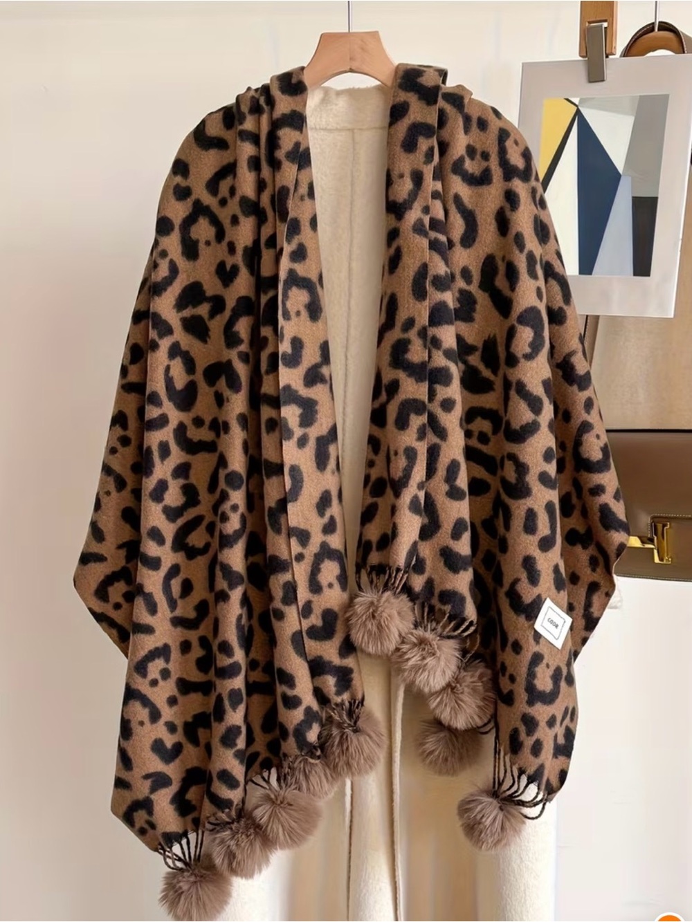 NWOT one Size Leopard Wrap with Pom Pom Hem